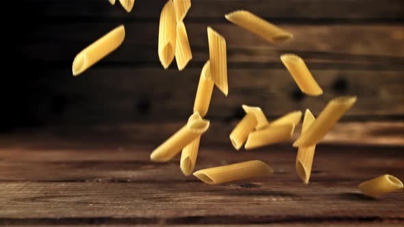 Pasta Penne Dry Falls on the Table alt