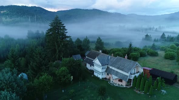 Aerial House With Fog Background 4k