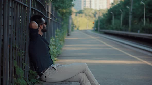 Man Waiting Train.Businessman On Perone Waiting Train Station alt