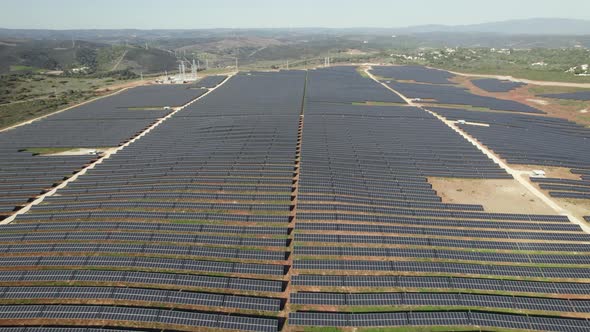 Rows of panel for solar energy at Lagos in Portugal. Aerial forward