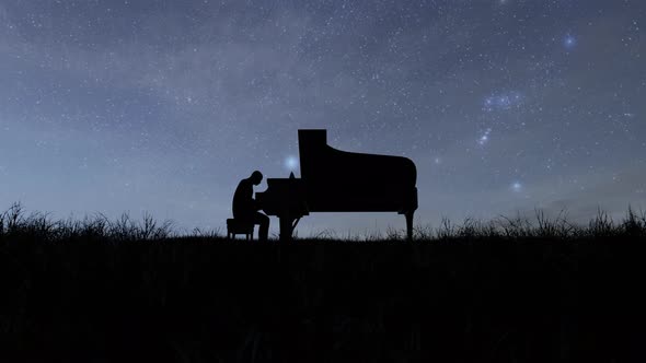 Silhouette Of A Man Playing Piano With Night Background