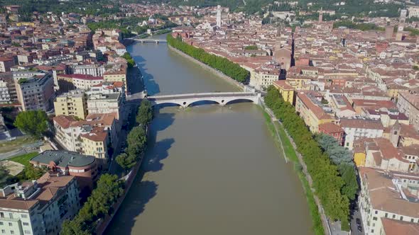 Verona, Italy: Aerial view of river and Bridges.Drone flies over the Adige river. Aerial video in 4K alt