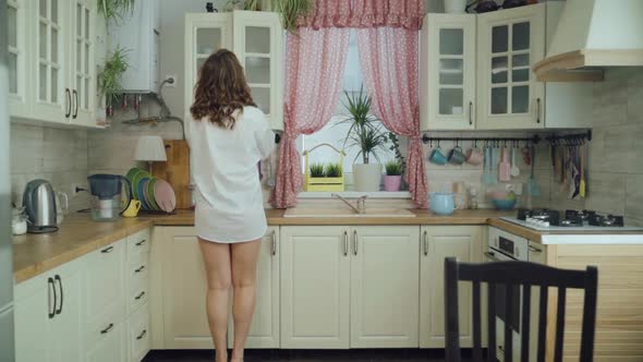 Beautiful Young Woman Home Kitchen alt