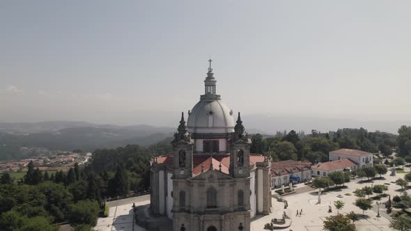 Church dome and bell towers, Sameiro Sanctuary, Braga, Portugal. Aerial pullback alt