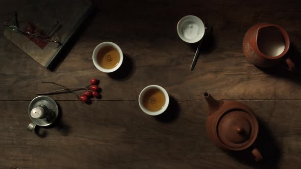 Top view over two cups of steaming tea