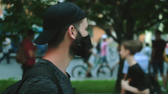 Picket Demonstration Against Pandemic Restrictions People in Face Mask Marching alt