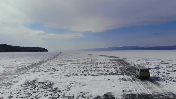 Car Driving on Ice Road of Lake Baikal