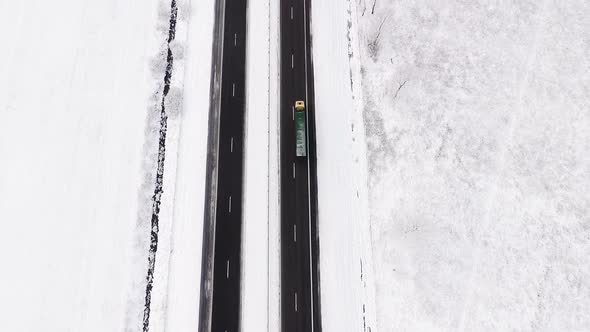 Above Winter Highway With Truck Passing By