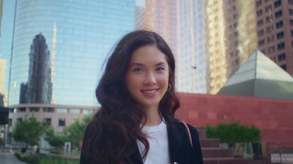 Portrait of Woman Smiling Walking Street alt