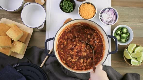 Step by step. Cooking homemade turkey chili for dinner. alt