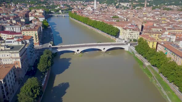 Verona, Italy: Aerial view of river and Bridges.Drone flies over the Adige river. Aerial video in 4K alt