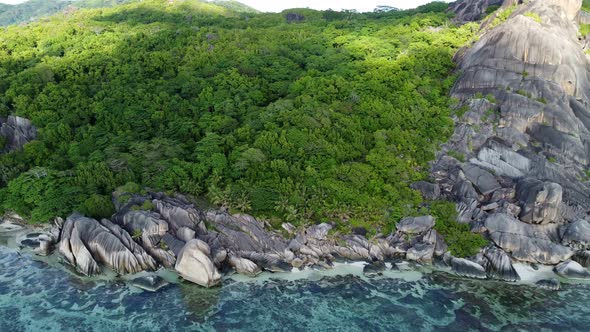 beach with large stones on the island of La Digue