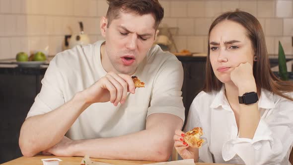 Family Hardly Eats Pizza Which Was Ordered Home