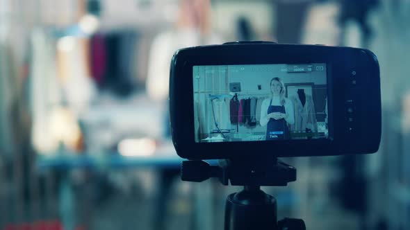 Seamstress is Filming a Vlog in the Workshop alt