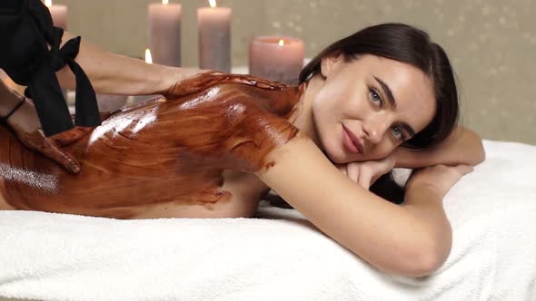 Charming Woman Getting Massage and Looking To Camera alt