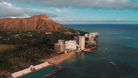 Aerial drone footage of Honolulu, Hawaii. Beautiful real estate, buildings in the city. Palm trees alt