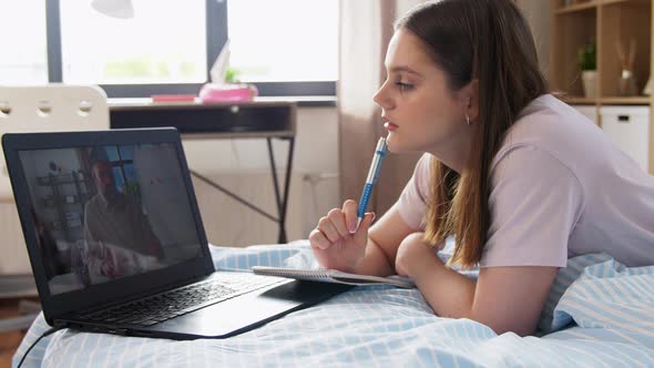 Student Girl with Laptop Learning Online at Home