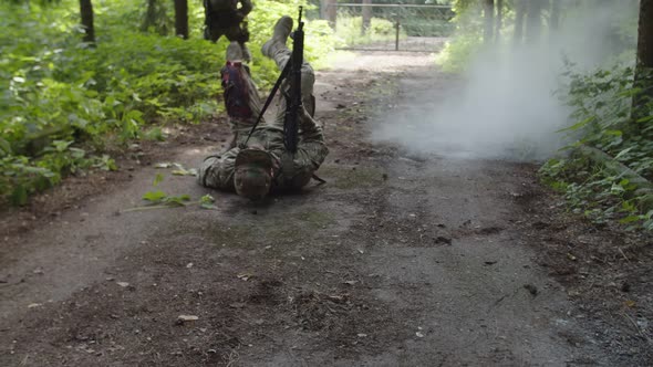 Healthcare Specialist Evacuating Wounded Soldier From Point of Injury alt