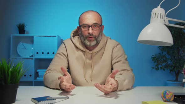 Man Communicates Via Video Link in  UHD alt