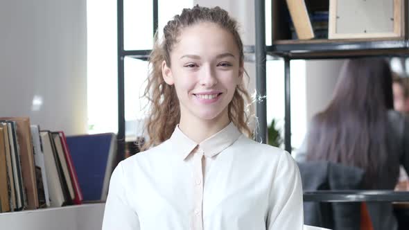 Portrait Of Smiling Beautiful Woman, Indoor Office alt