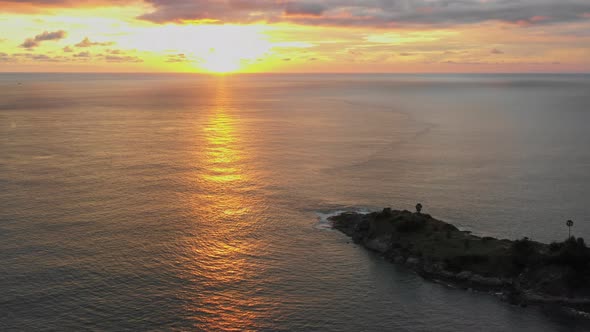 Aerial View Yellow Sky In Sunset Above Promthep Cape Viewpoint Phuket Thailand alt