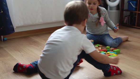 Two Happy Preschool Siblings Children Boy Girl In Playing Room