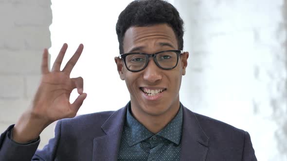Okay Sign By Satisfied African Businessman alt