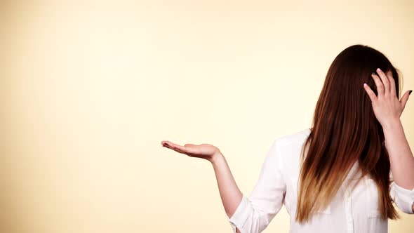 Woman Holds Empty Hand Copy Space for Product alt
