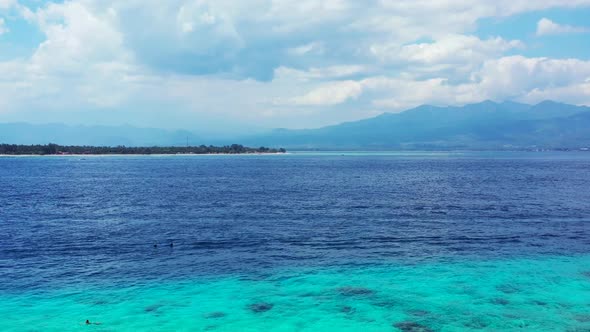 Aerial drone view tourism of beautiful sea view beach holiday by aqua blue water and white sand back alt