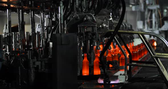 Manufacturing with Automated Conveyor Line for Production of Glass Bottles. alt