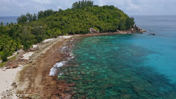 Aerial Footage of Exotic Beach with Old Corals During Tide alt