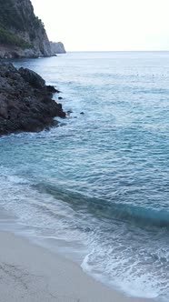 Vertical Video Sea Near the Coast  Closeup of the Coastal Seascape alt