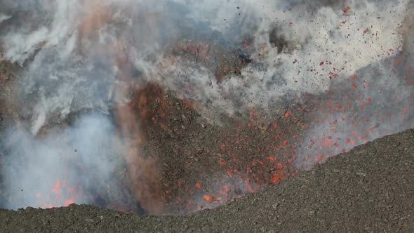 Red Hot Lava, Gas, Steam and Ashes Eruption from Crater of Active Volcano