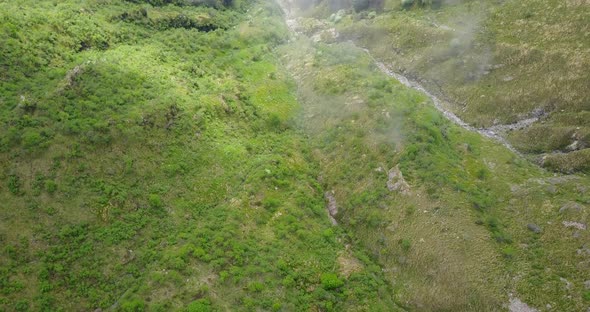 Aerial drone view of the green hills above Lake Maggiore, Switzerland. alt