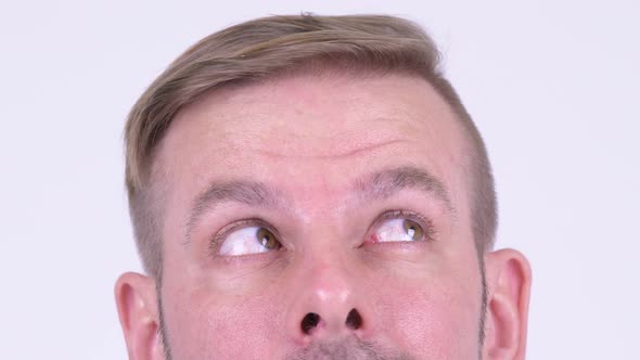 Eyes of Blonde Man Thinking alt