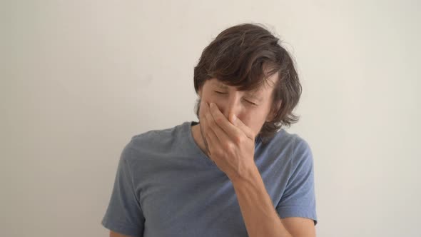 A Young Man Sneezes Improperly alt