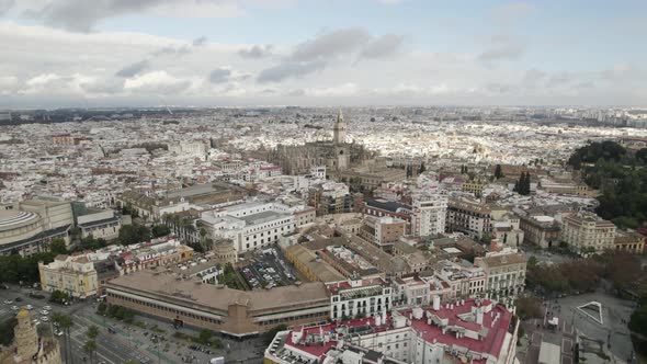 Seville city in Andalusia with view of grand Seville Cathedral; aerial