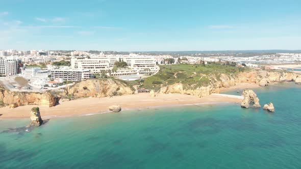 Panoramic view of Praia do Pinhao and Praia de Dona Ana, Lagos, Algarve. Beach holidays concept alt