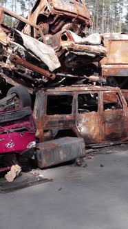 Vertical Video of Wardestroyed Cars in Ukraine alt