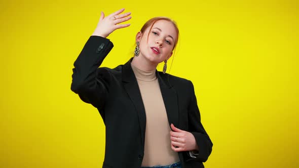 Confident Elegant Redhead Young Businesswoman Closing One Eye with Hand Looking at Camera alt