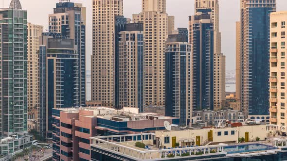 Aerial View of Dubai Marina From a Vantage Point at Sunset Timelapse alt