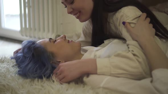 Young Lesbians on the Couch Hugging and Kissing Soft and Tender Spbd alt