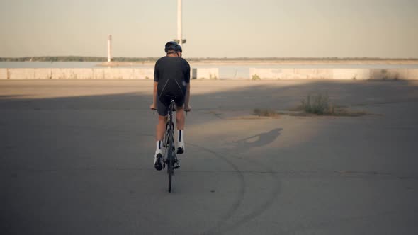 Bike Cycling.Cyclist Fitness Riding On Road Bike.Cyclist Triathlete Training Workout On Bicycle. alt