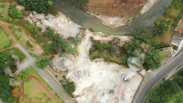 Aerial View Over the Hot Springs Facilities on the Volcanic Shore alt