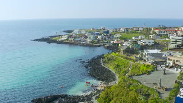 A resort where you can see the emerald sea and cafes. Jeju Island Handam Beach. alt