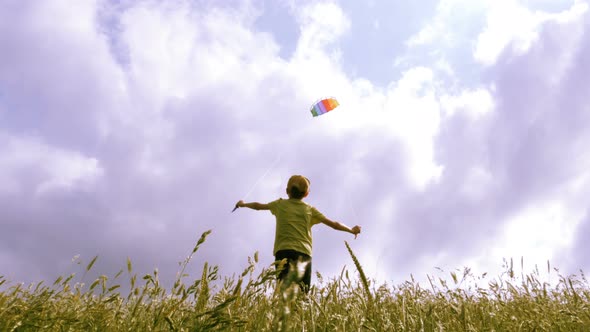 A Kid Flying in Blue Sky with Some Clouds