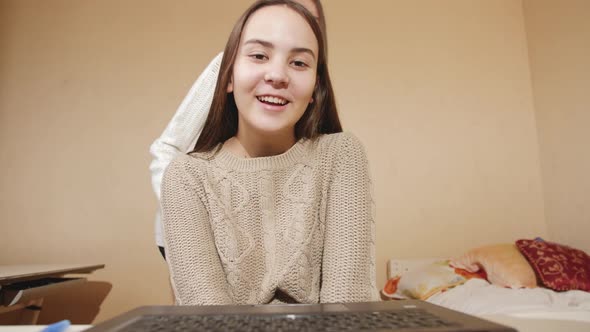 Happy Smiling Teenage Girls Having Online Conference on Laptop alt