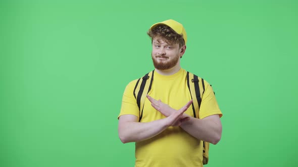 Portrait of Young Men Strictly Gesturing with Hands Shape Meaning Denial Saying NO alt