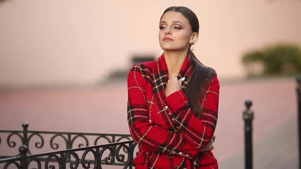 Glamourous Woman in Trendy Red Coat