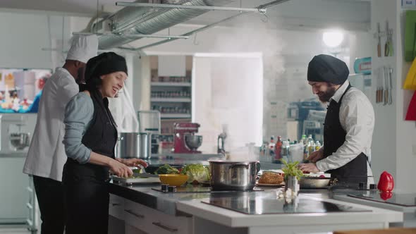 POV of Woman and Man Recording Professional Cooking Show alt